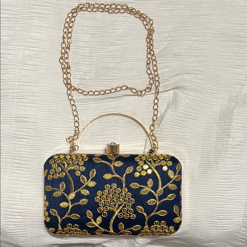 Elegant Gold and Black Floral Clutch